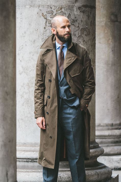 man wearing trench coat